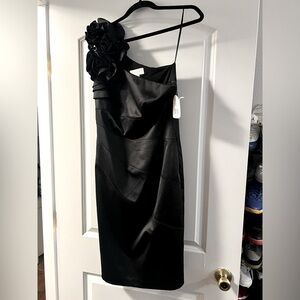 This off the shoulder dress is a cute for any special event!